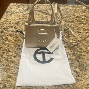 NWT small gold Telfar shopping bag